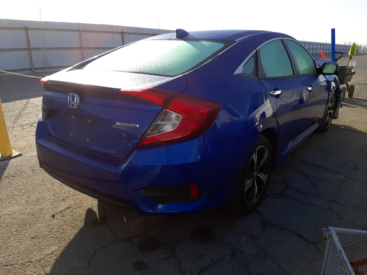Photo 4 from auction – 2016 HONDA CIVIC TOUR with VIN 2HGFC1F96GH640055