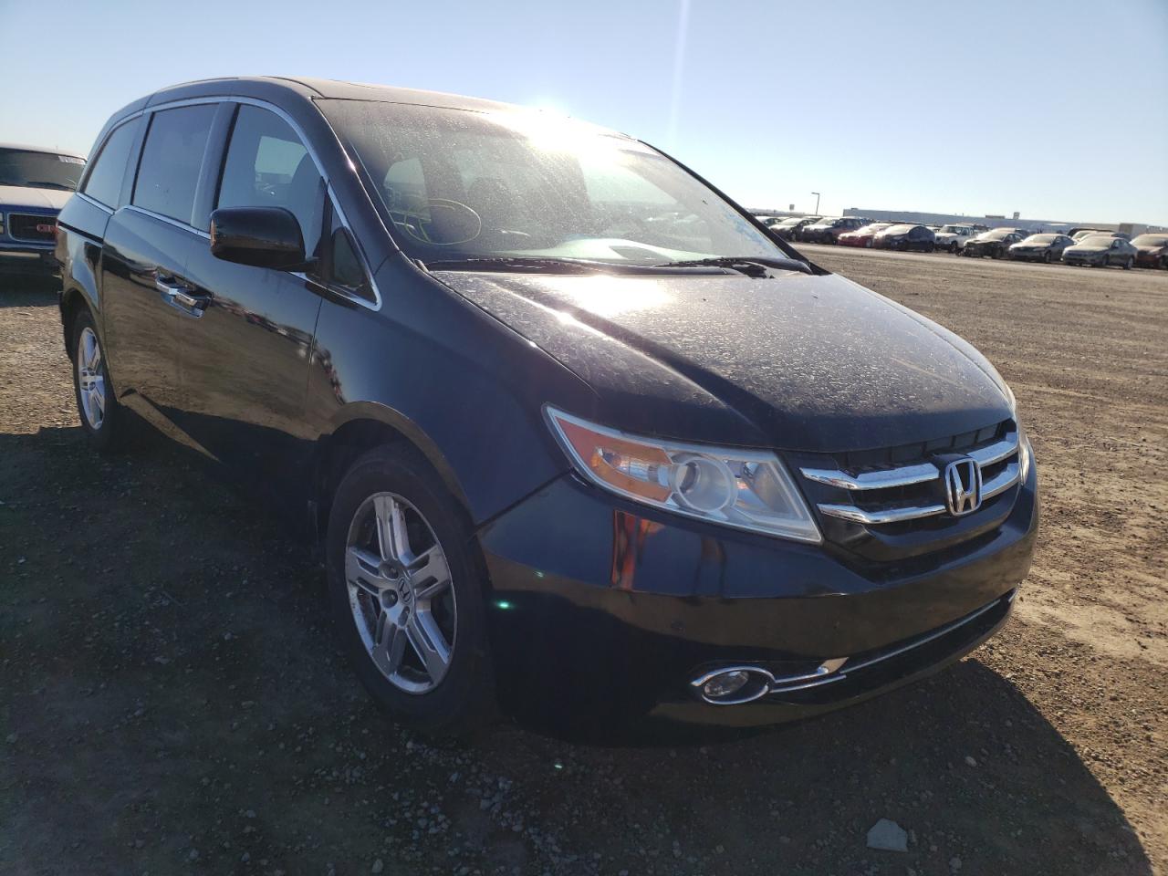 HONDA ODYSSEY TO 2012 with VIN 5FNRL5H92CB068918 - Photo from auction