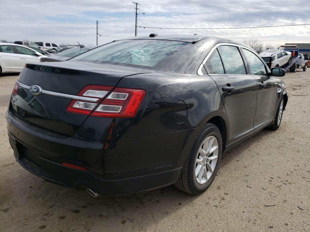 Photo 4 from auction – 2014 FORD TAURUS SE with VIN 1FAHP2D80EG170082
