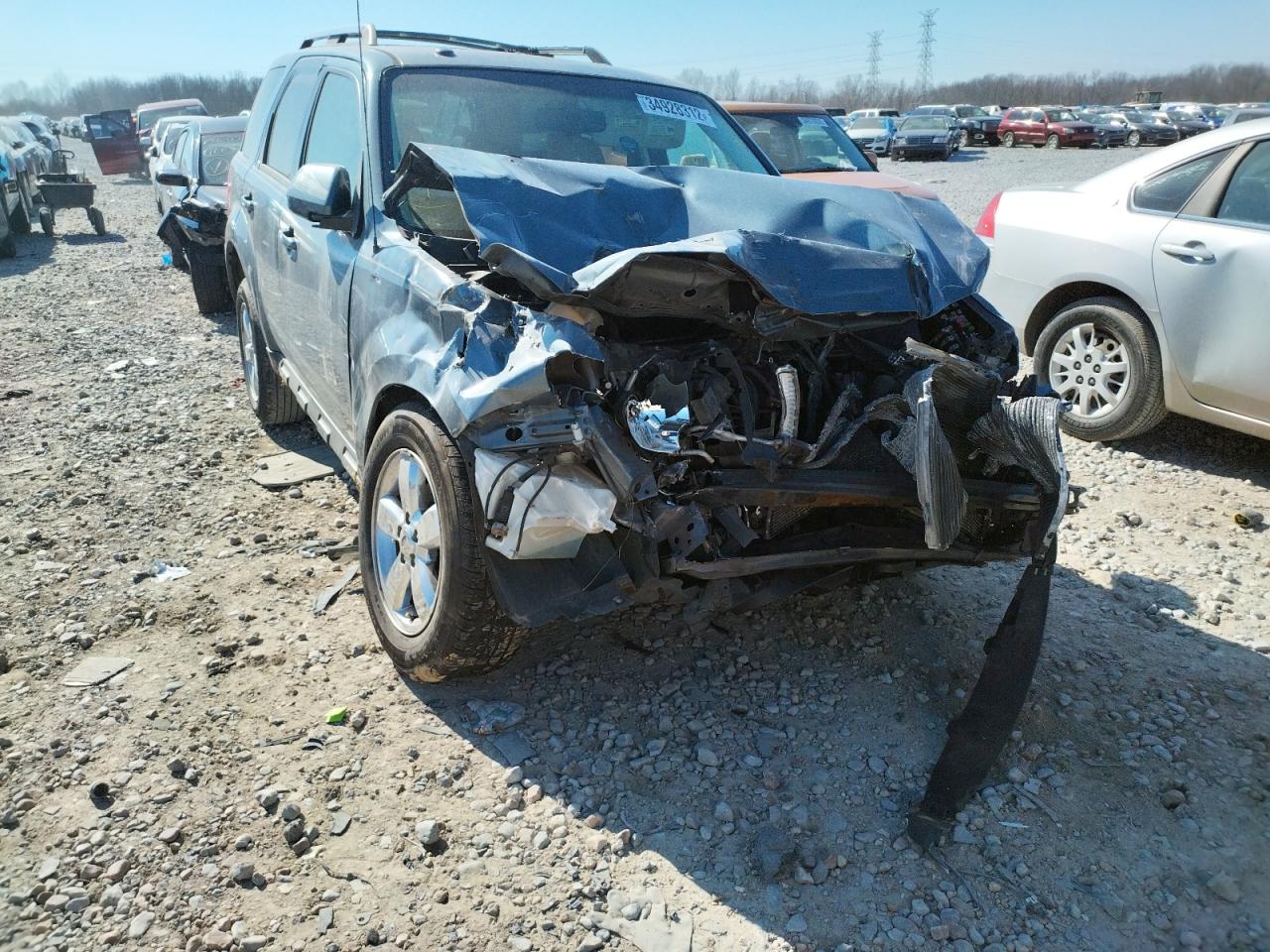 Photo 9 from auction – 2011 FORD ESCAPE LIM with VIN 1FMCU0E74BKB09782
