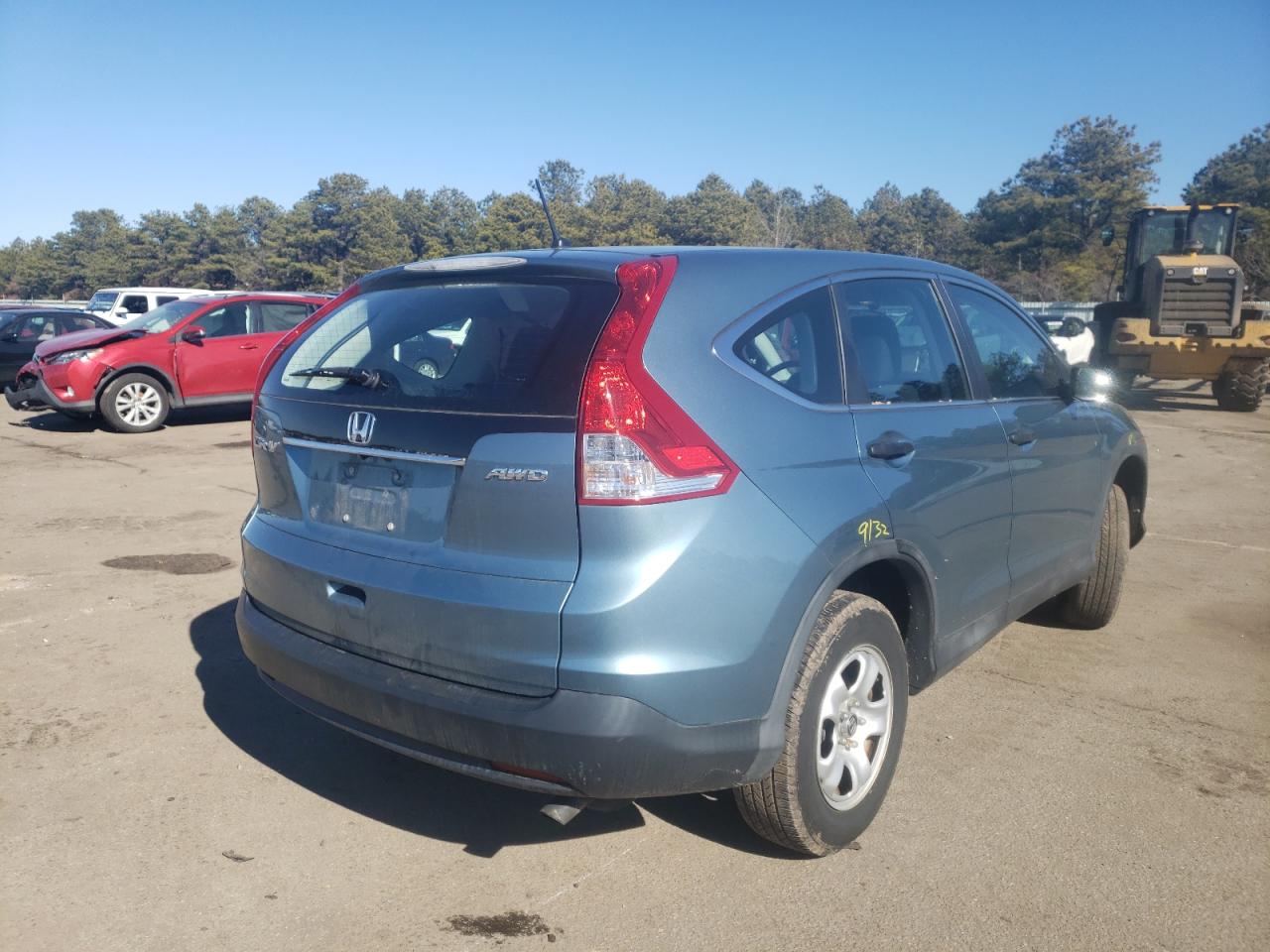 Photo 4 from auction – 2014 HONDA CR-V LX with VIN 2HKRM4H32EH714675