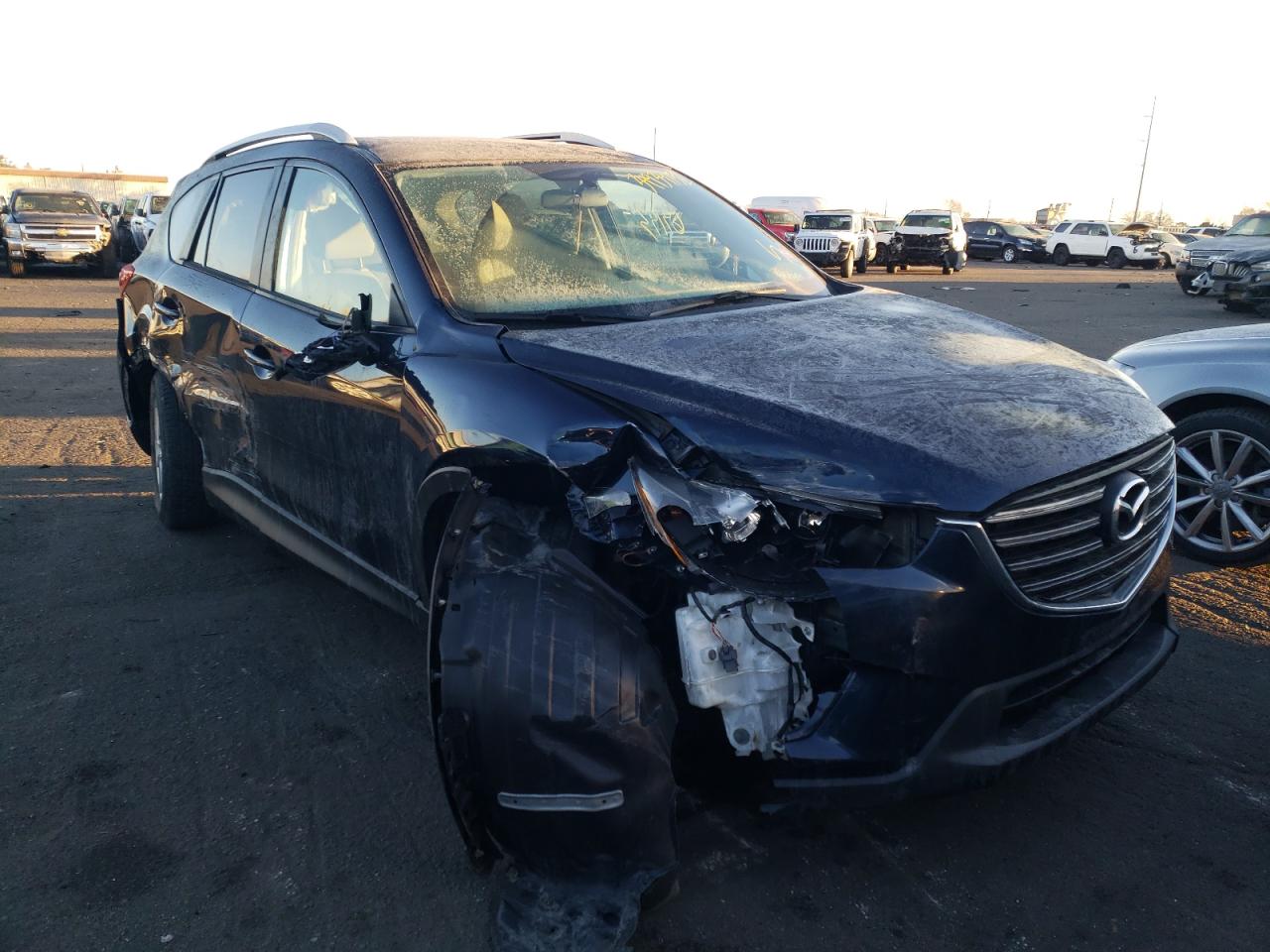 MAZDA CX-5 TOURI 2016 with VIN JM3KE4CY9G0910251 - Photo from auction
