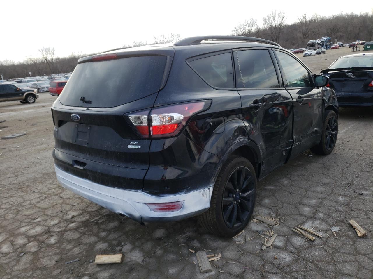 Photo 4 from auction – 2018 FORD ESCAPE SE with VIN 1FMCU0GD3JUB24800