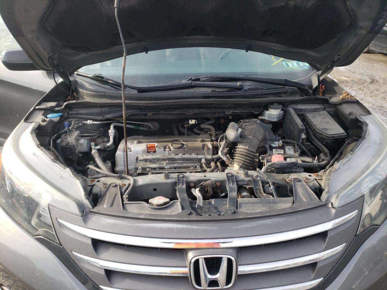 Photo 7 from auction – 2014 HONDA CR-V LX with VIN 2HKRM4H33EH686286