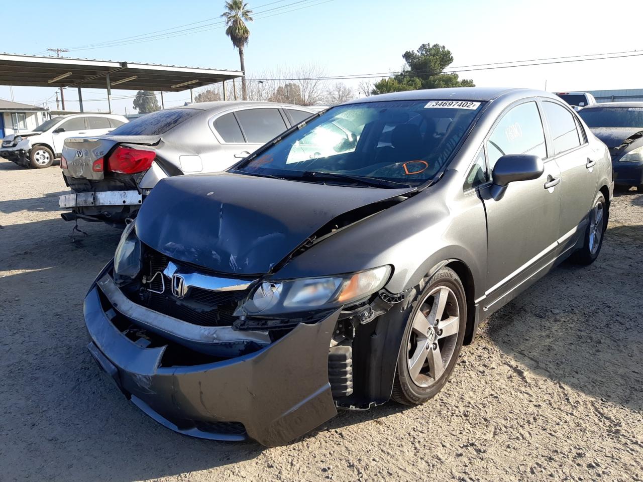 Photo 2 from auction – 2011 HONDA CIVIC LX-S with VIN 2HGFA1F65BH502902