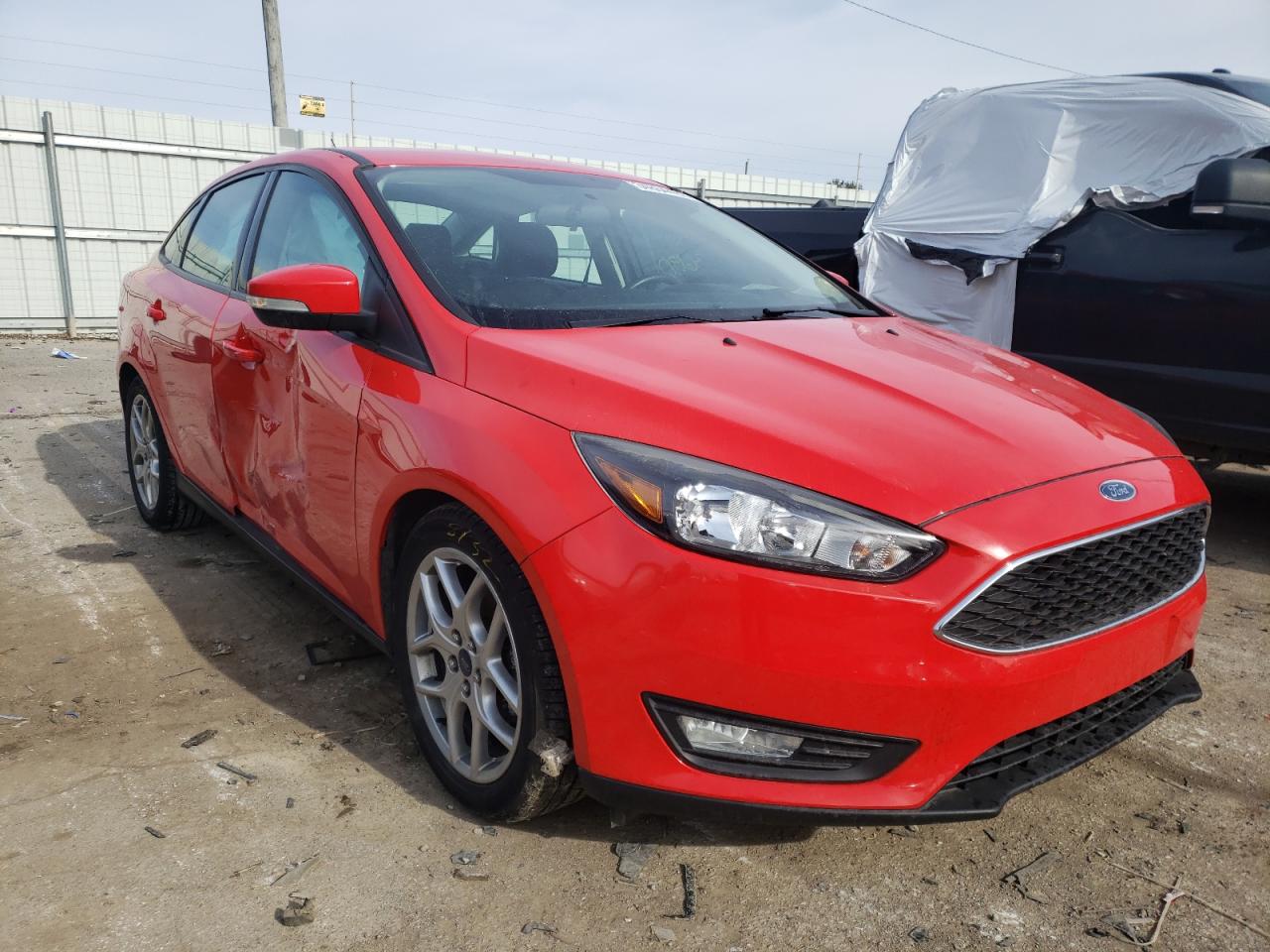 FORD FOCUS 2015 with VIN 1FADP3F24FL355998 - Photo from auction