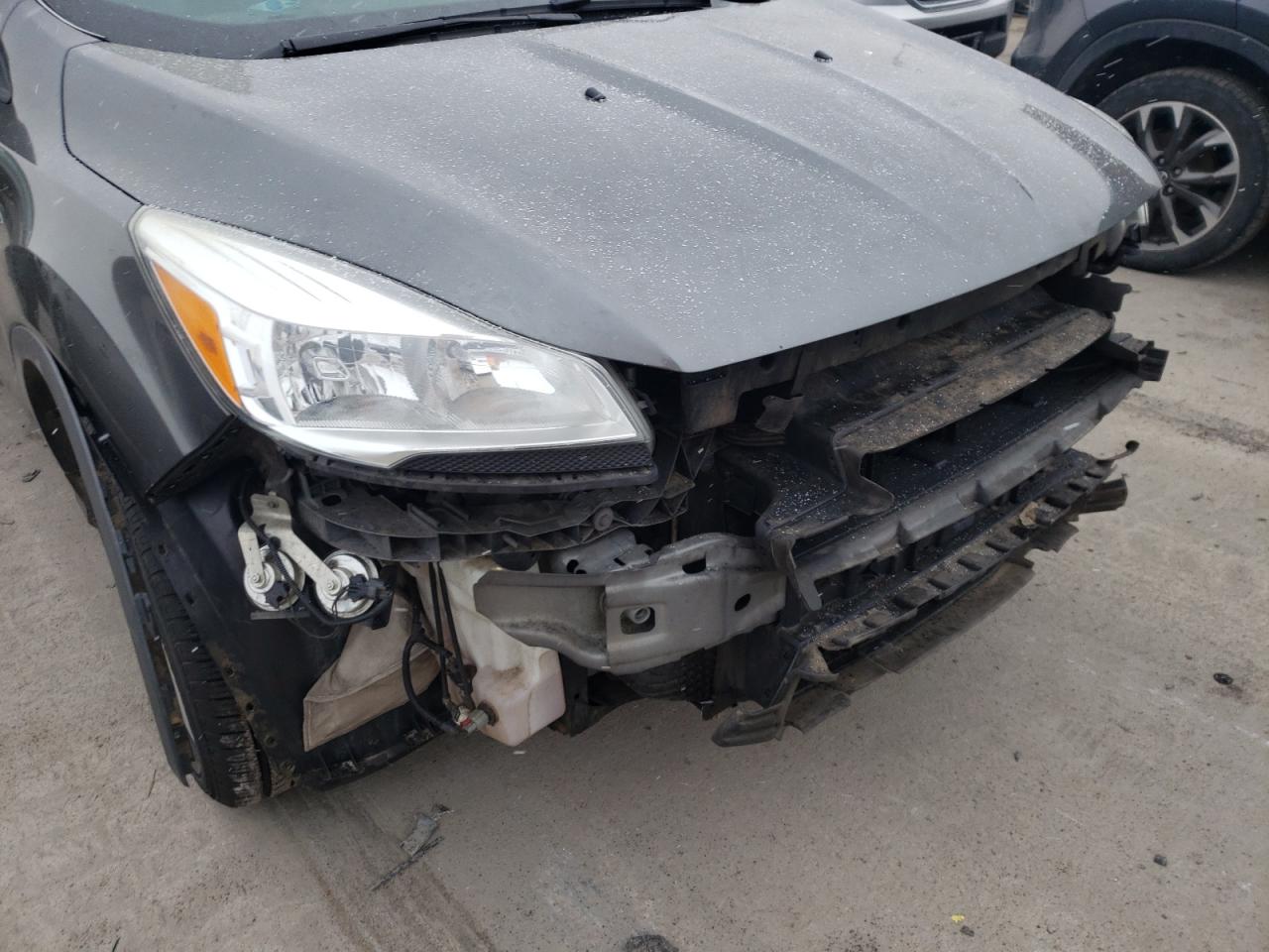 Photo 9 from auction – 2015 FORD ESCAPE SE with VIN 1FMCU9G90FUB30352