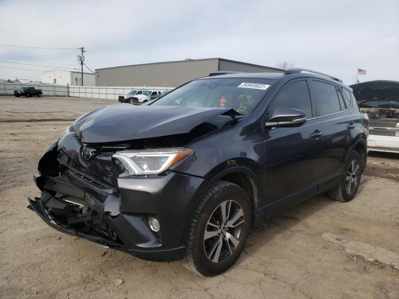 Photo 2 from auction – 2017 TOYOTA RAV4 XLE with VIN JTMRFREV0HJ151585
