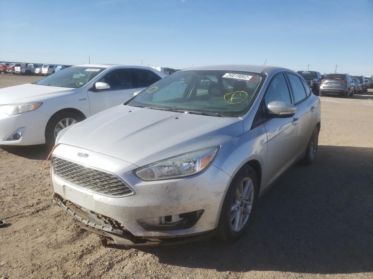 Photo 2 from auction – 2015 FORD FOCUS SE with VIN 1FADP3F25FL207519