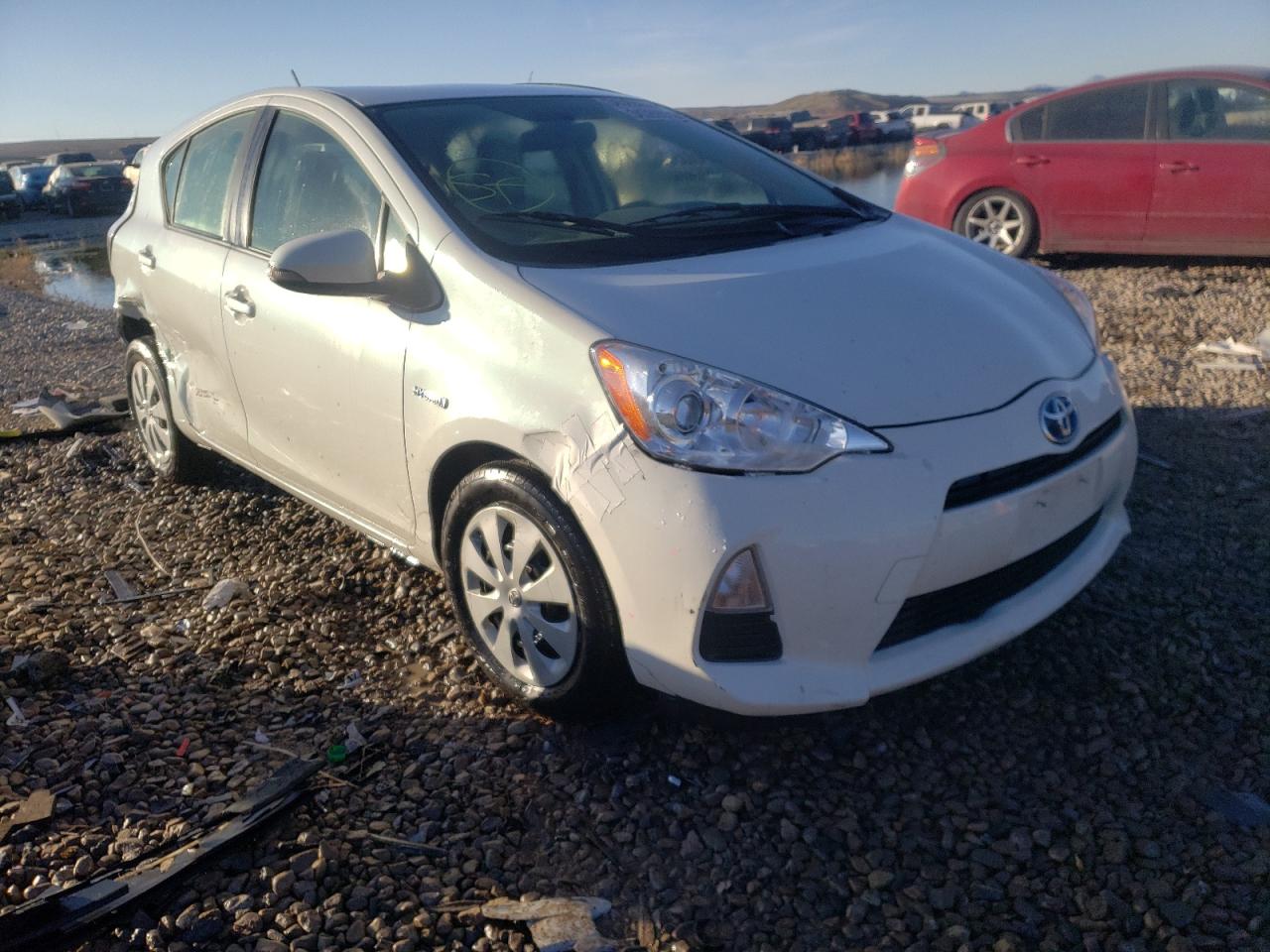 TOYOTA PRIUS C 2014 with VIN JTDKDTB37E1065595 - Photo from auction