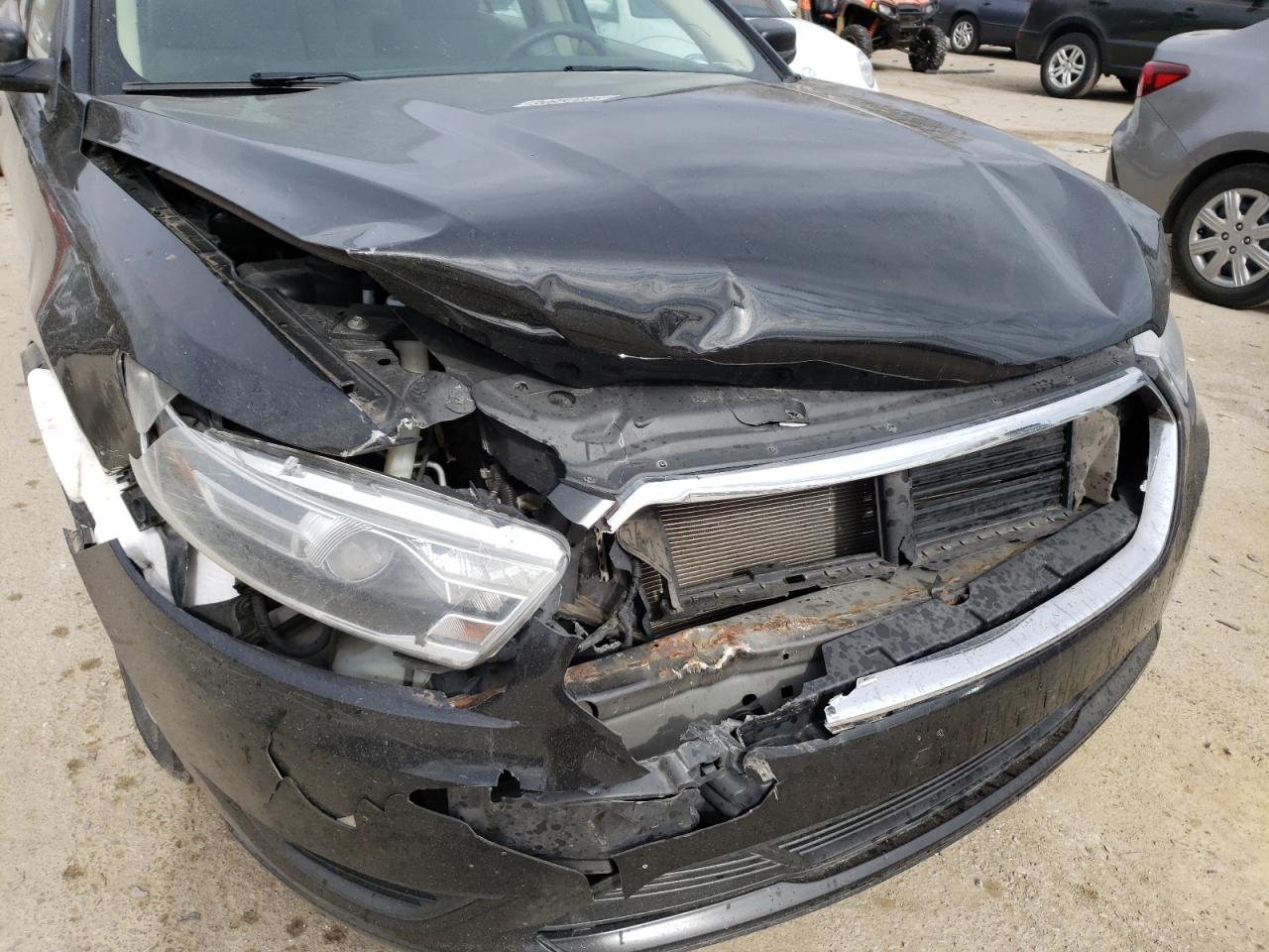 Photo 9 from auction – 2014 FORD TAURUS SE with VIN 1FAHP2D80EG170082
