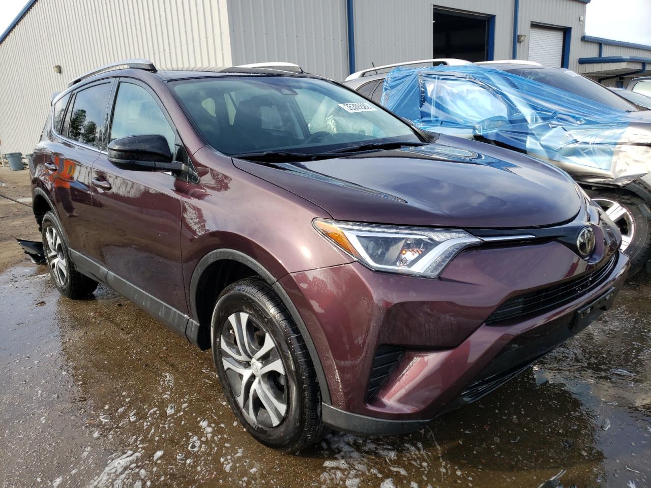 TOYOTA RAV4 LE 2018 with VIN 2T3BFREV2JW784498 - Photo from auction