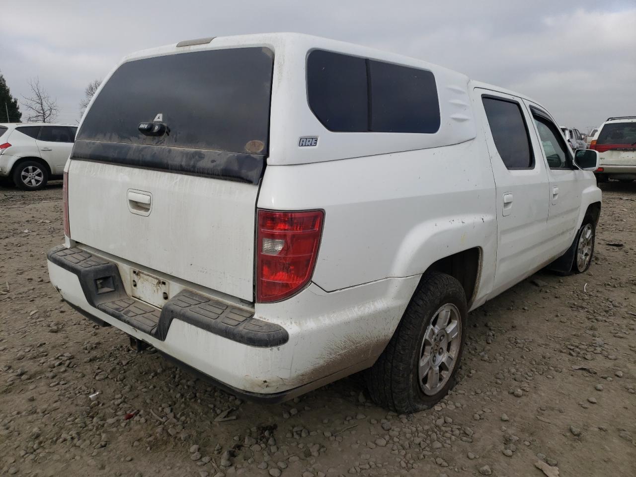Photo 4 from auction – 2010 HONDA RIDGELINE with VIN 5FPYK1F46AB006716