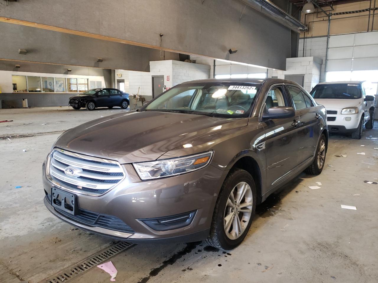 Photo 2 from auction – 2015 FORD TAURUS SEL with VIN 1FAHP2E84FG161224