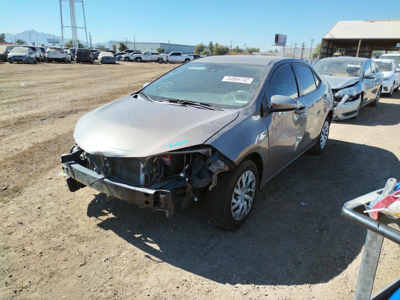 Photo 2 from auction – 2017 TOYOTA COROLLA L with VIN 5YFBURHE3HP690099