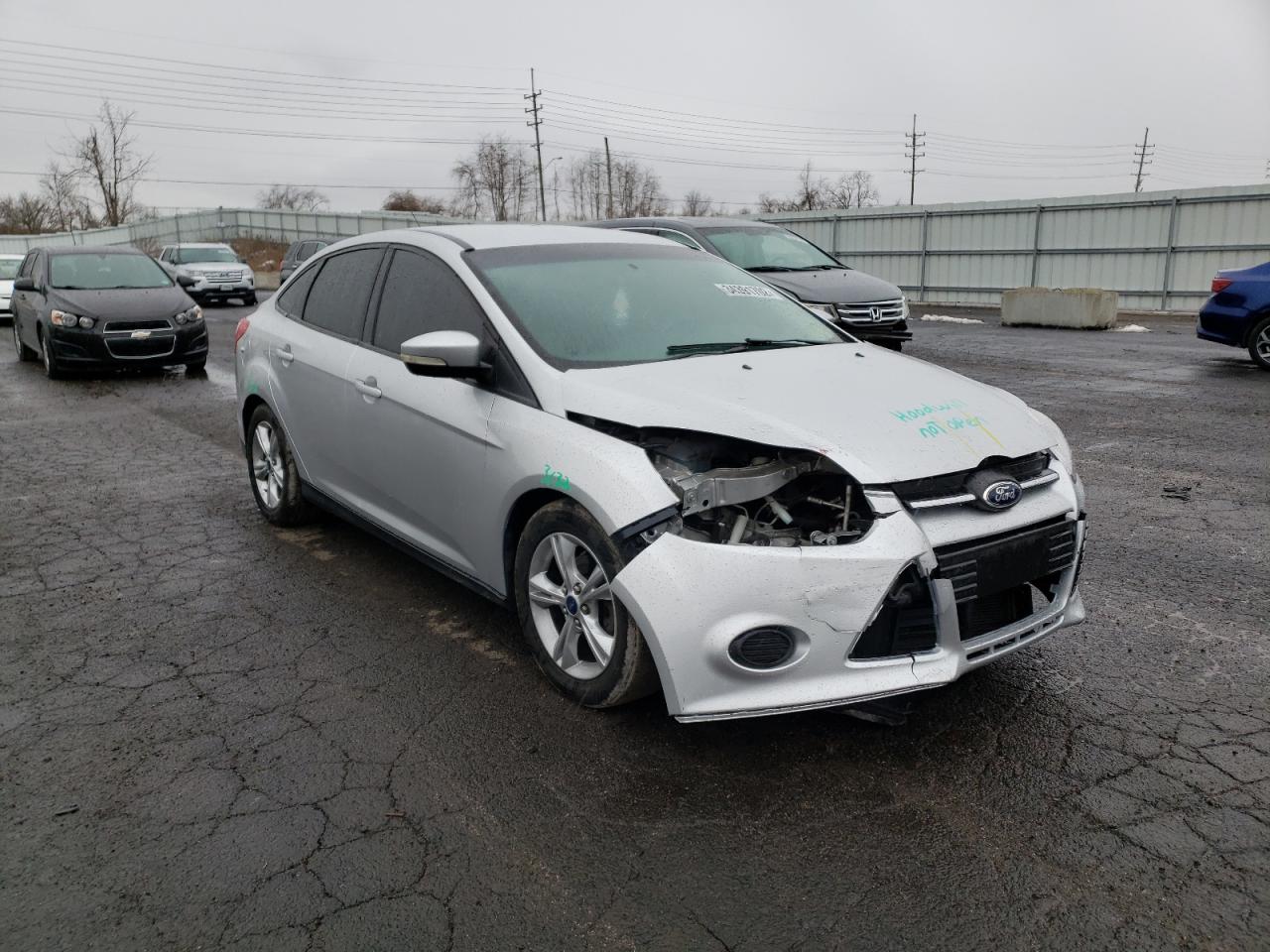 FORD FOCUS SE 2014 with VIN 1FADP3F23EL256197 - Photo from auction