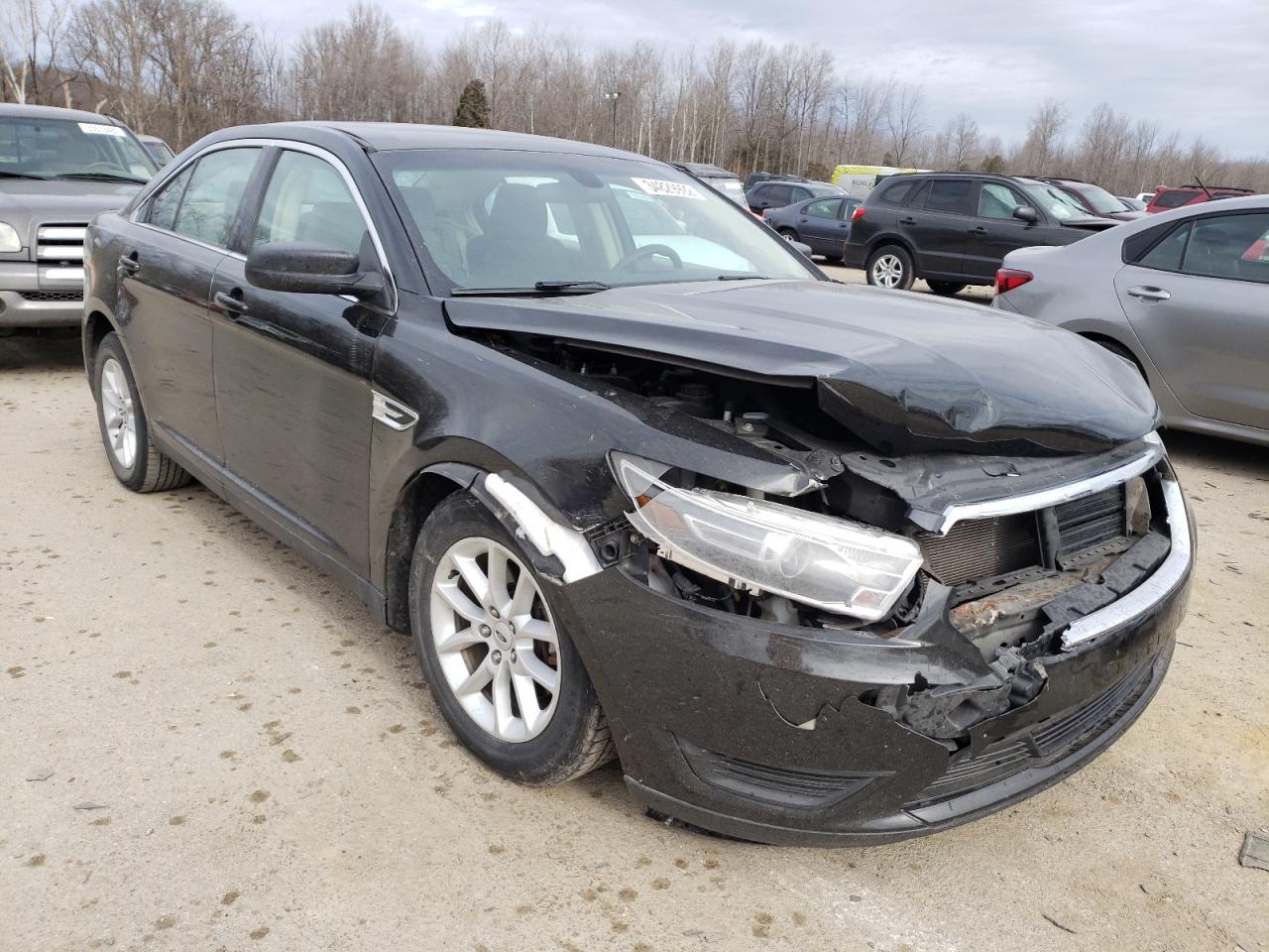 FORD TAURUS SE 2014 with VIN 1FAHP2D80EG170082 - Photo from auction