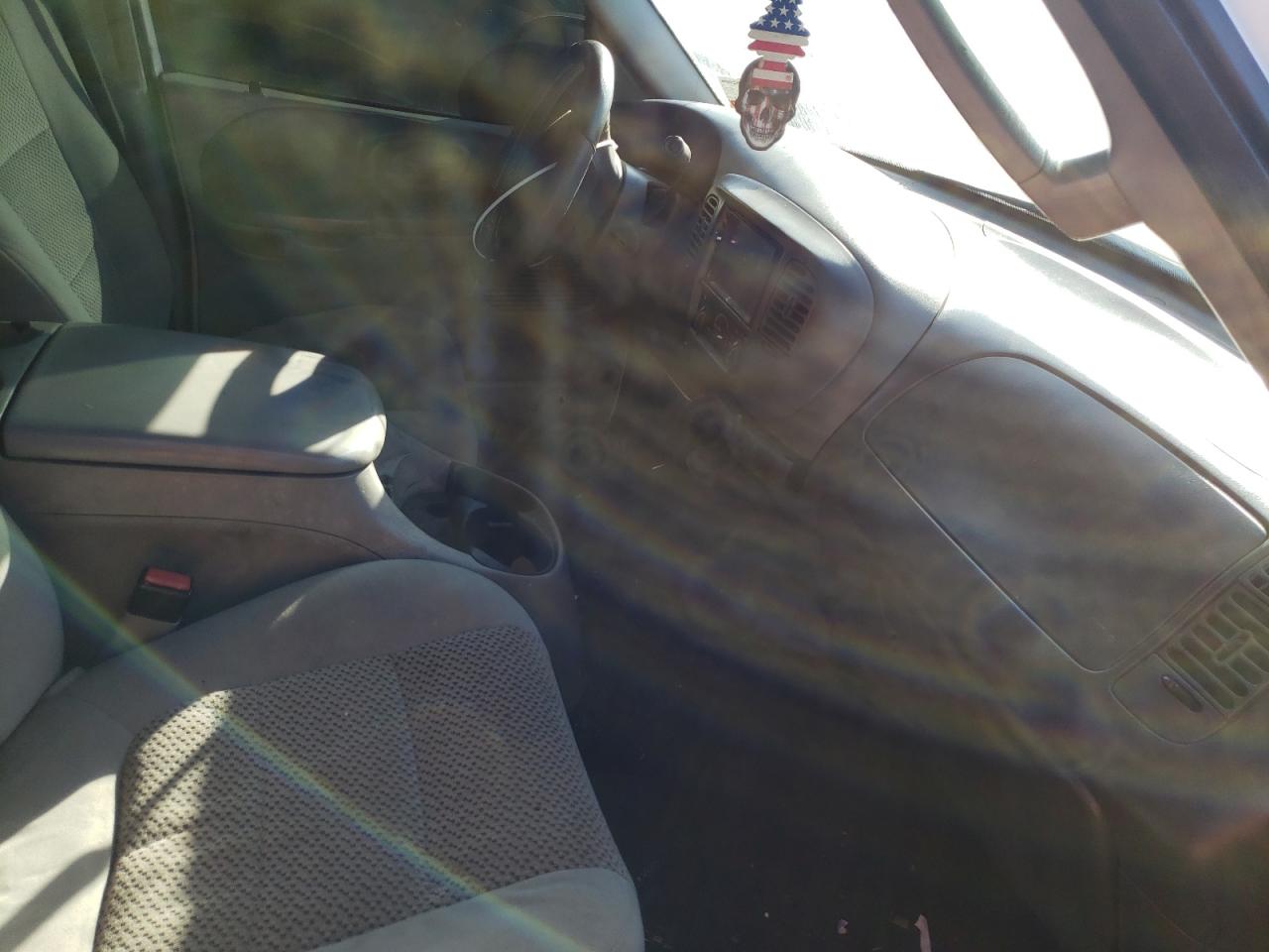 Photo 5 from auction – 2003 FORD F150 SUPER with VIN 1FTRW07L63KB41640