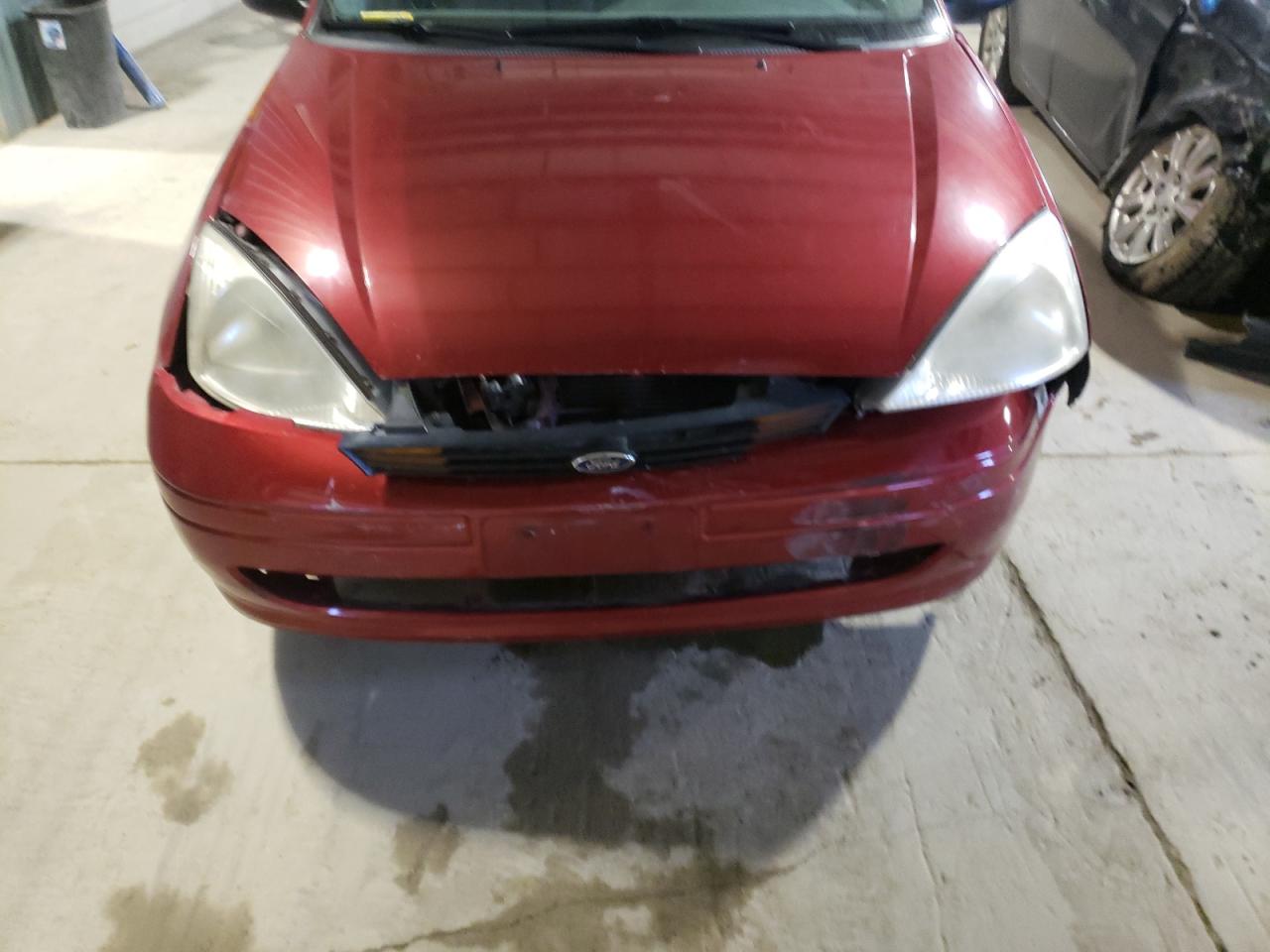Photo 9 from auction – 2000 FORD FOCUS LX with VIN 1FAFP33P3YW320573