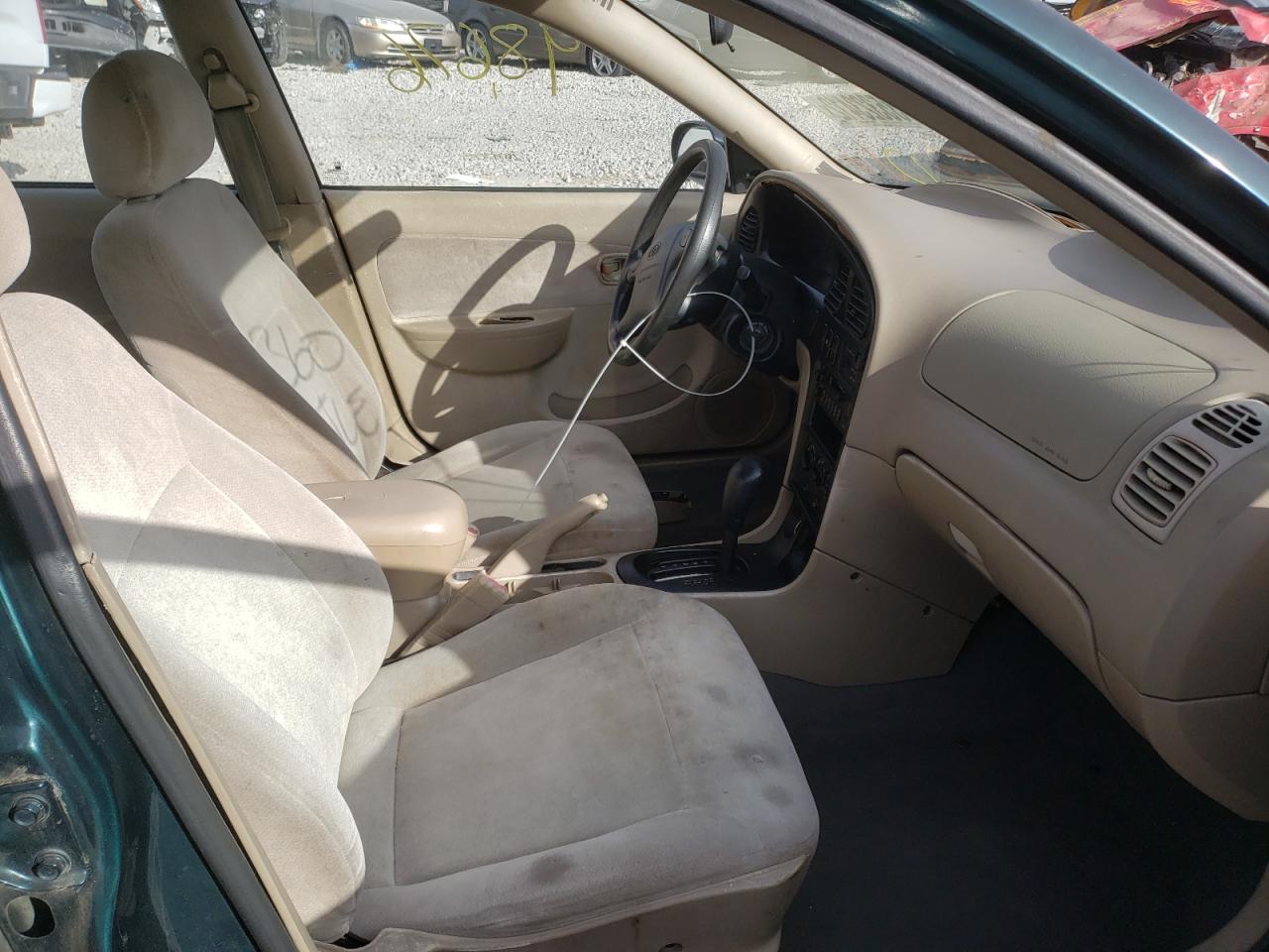 Photo 5 from auction – 2000 KIA SEPHIA BAS with VIN KNAFB121XY5909164