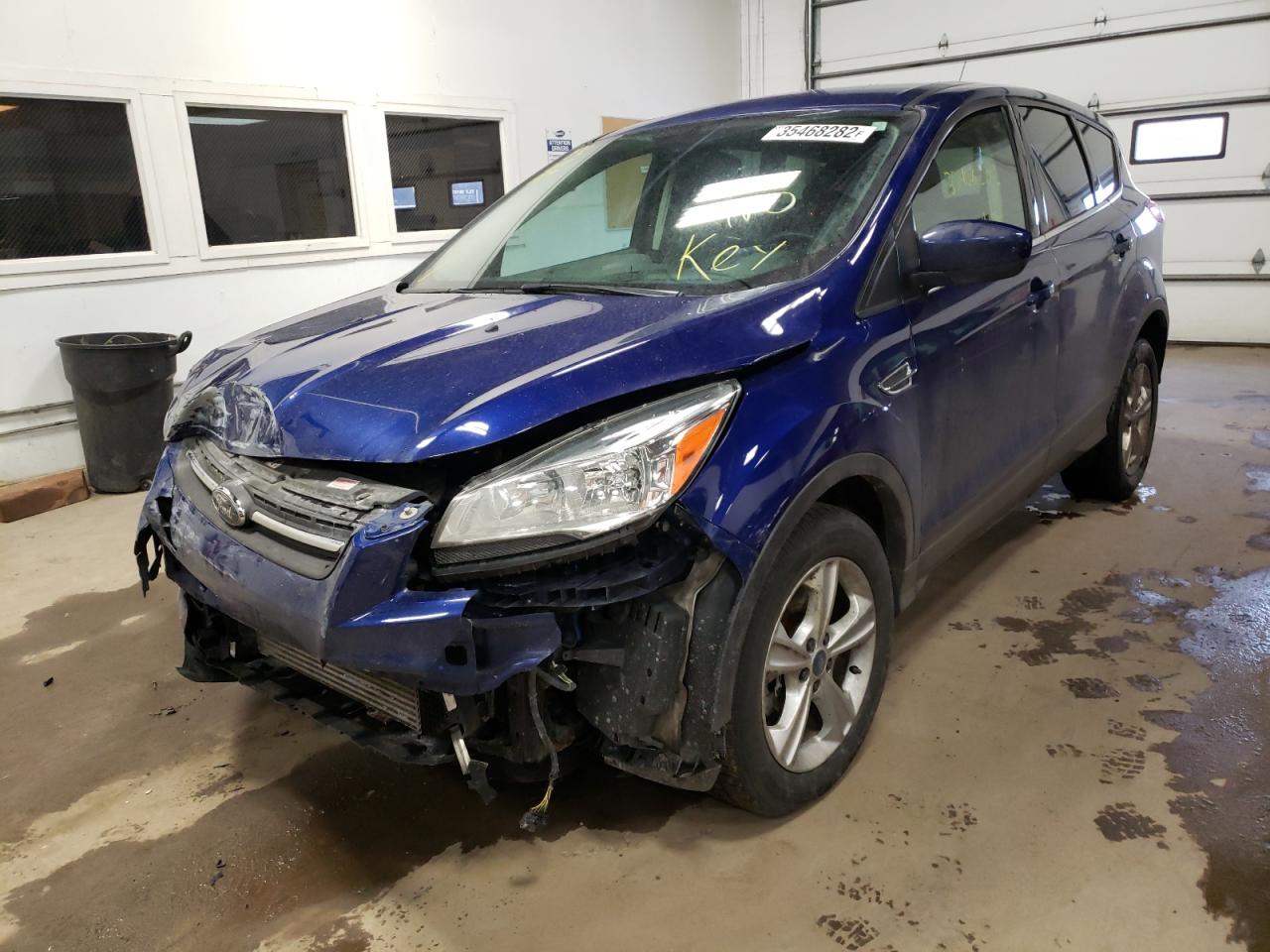 Photo 2 from auction – 2015 FORD ESCAPE SE with VIN 1FMCU9GX3FUC36292