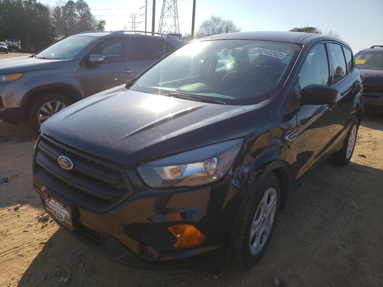Photo 2 from auction – 2018 FORD ESCAPE S with VIN 1FMCU0F76JUA35752