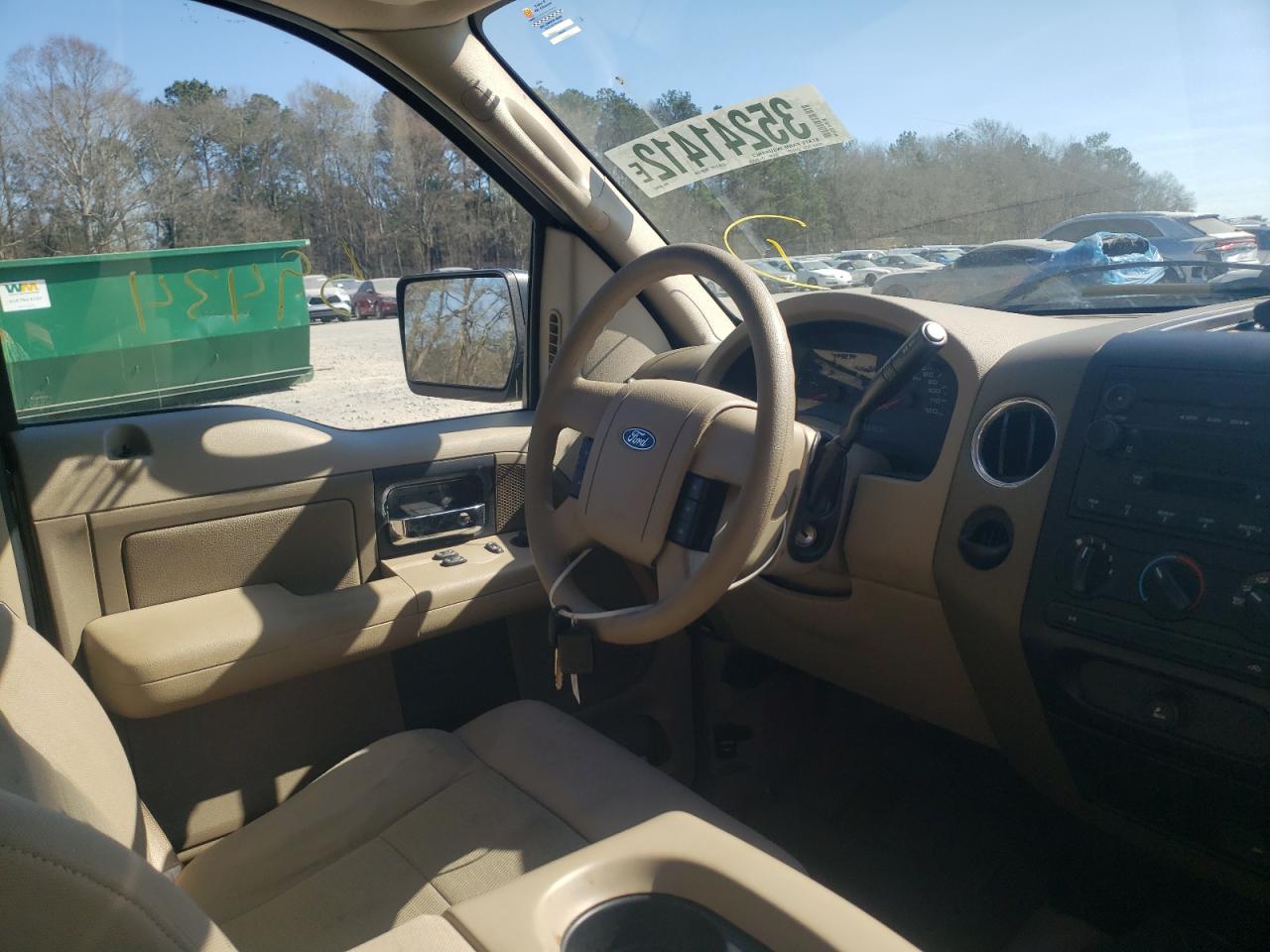 Photo 9 from auction – 2004 FORD F150 with VIN 1FTRF12W44NA69943