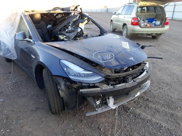 TESLA MODEL 3 2020 with VIN 5YJ3E1EBXLF663290 - Photo from auction