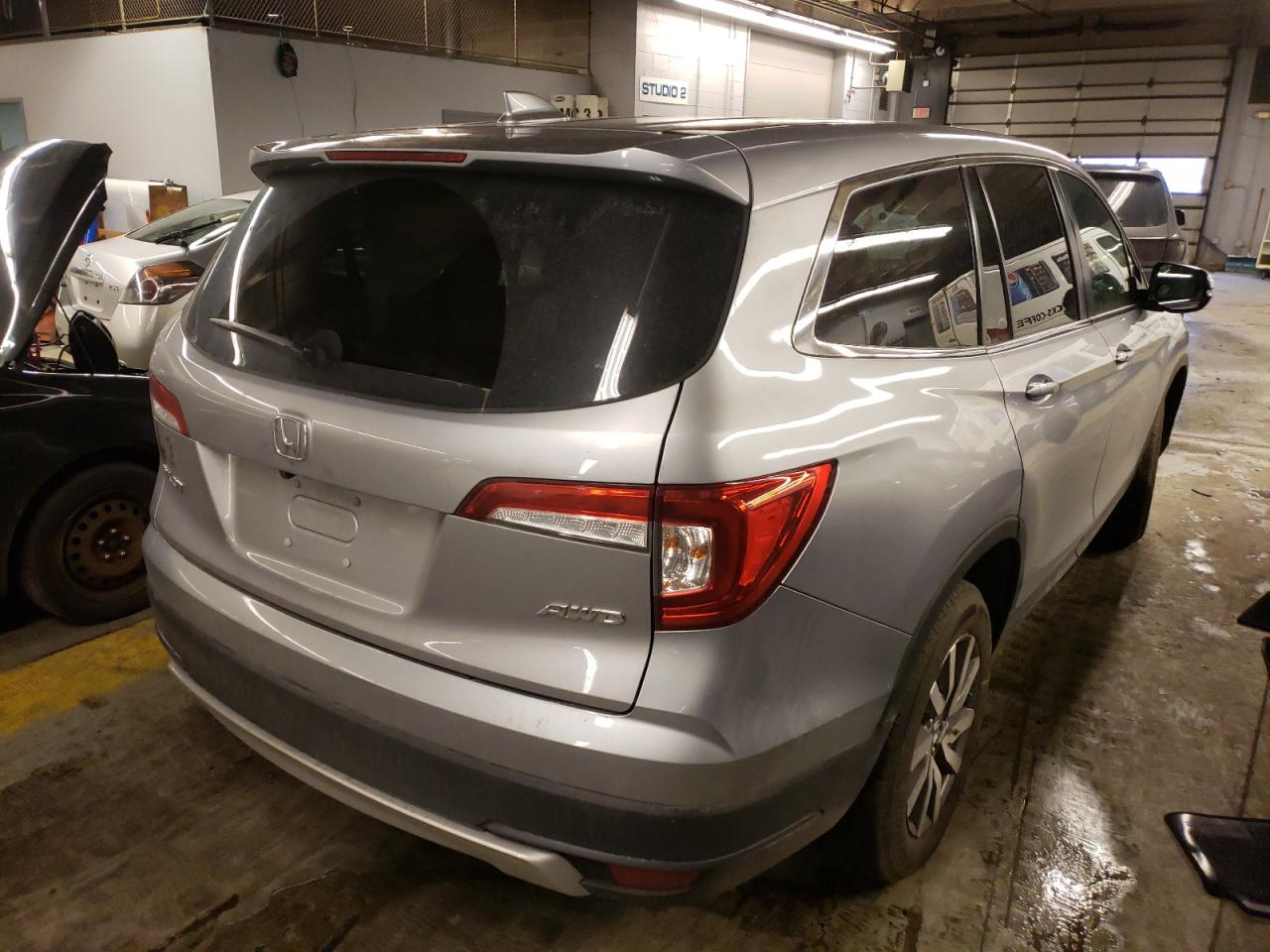 Photo 4 from auction – 2021 HONDA PILOT EXL with VIN 5FNYF6H54MB048841