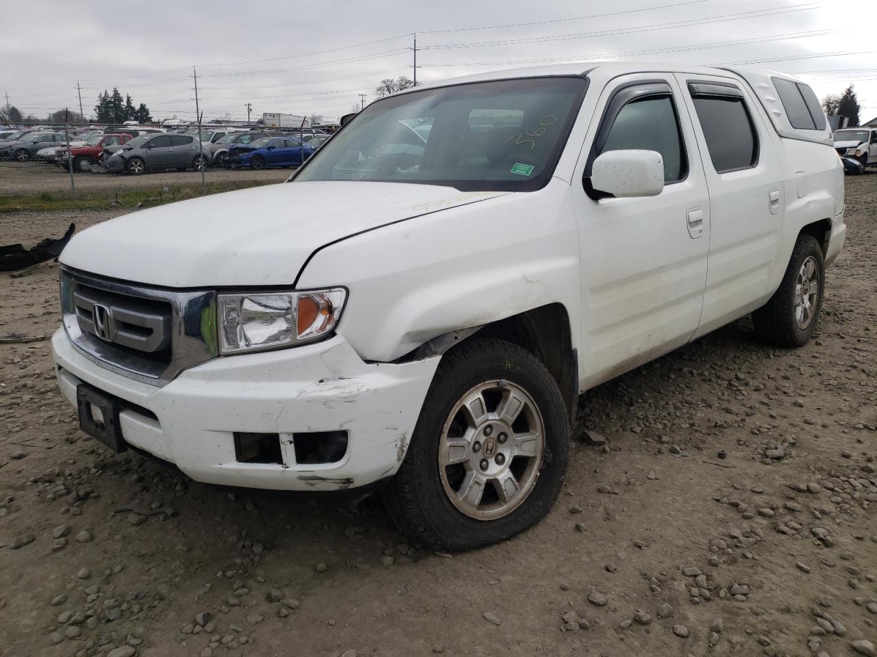 Photo 2 from auction – 2010 HONDA RIDGELINE with VIN 5FPYK1F46AB006716
