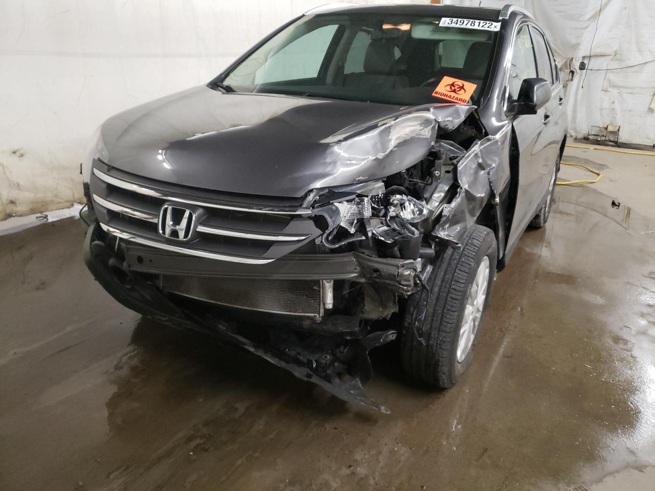 Photo 9 from auction – 2014 HONDA CR-V EXL with VIN 2HKRM4H73EH664386