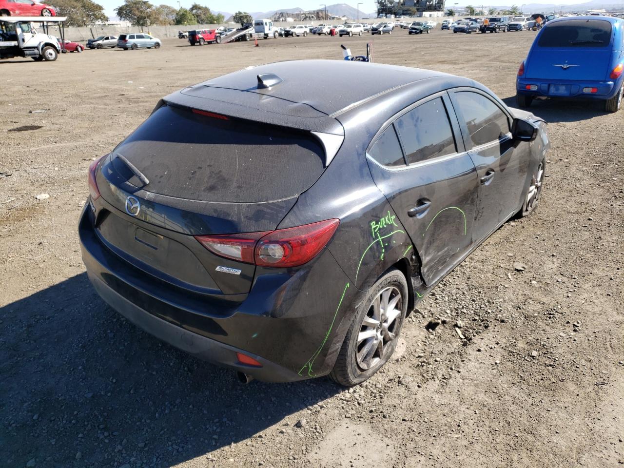 Photo 4 from auction – 2014 MAZDA 3 TOURING with VIN JM1BM1L73E1197825