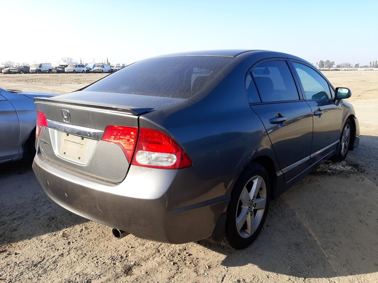 Photo 4 from auction – 2011 HONDA CIVIC LX-S with VIN 2HGFA1F65BH502902