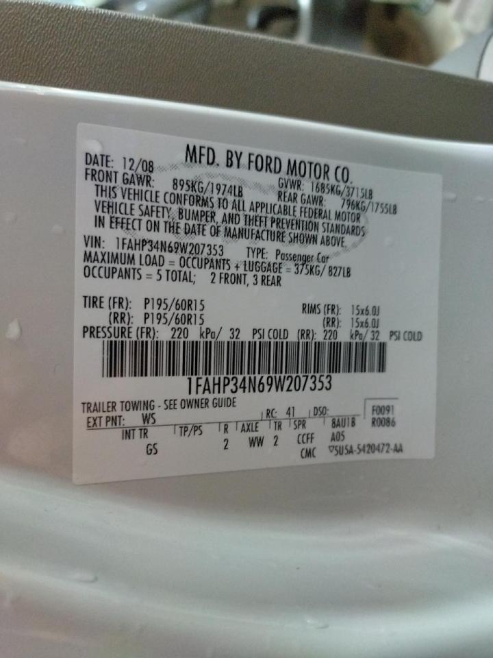 Photo 10 from auction – 2009 FORD FOCUS S with VIN 1FAHP34N69W207353