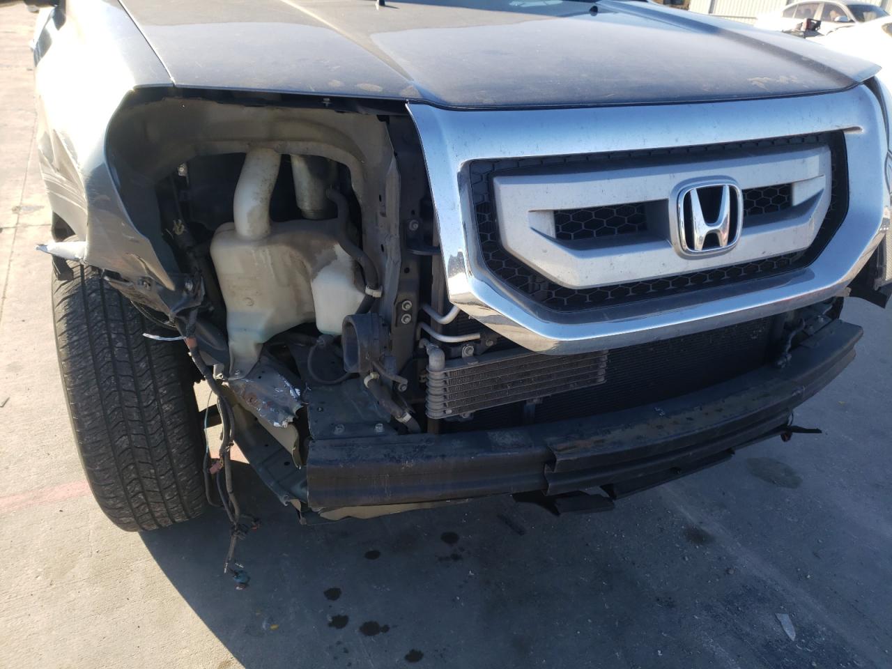 Photo 9 from auction – 2010 HONDA PILOT TOUR with VIN 5FNYF3H89AB022661