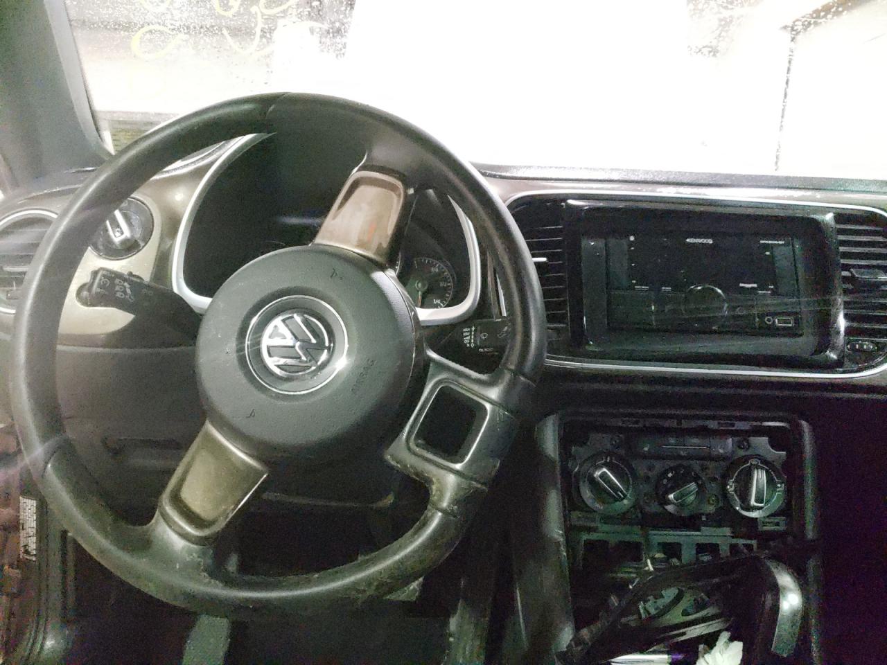Photo 9 from auction – 2012 VOLKSWAGEN BEETLE with VIN 3VWJP7AT2CM640131