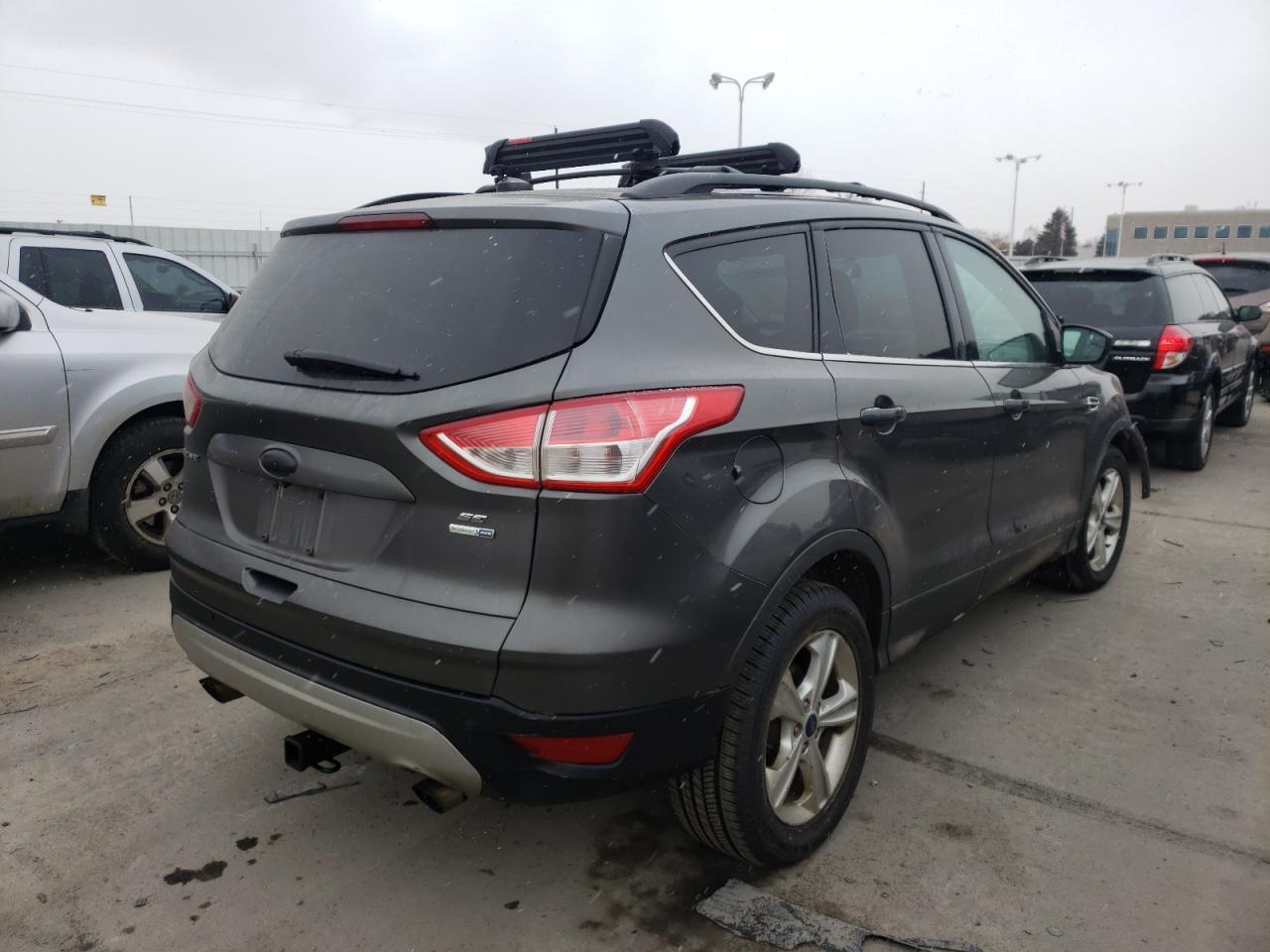 Photo 4 from auction – 2015 FORD ESCAPE SE with VIN 1FMCU9G90FUB30352