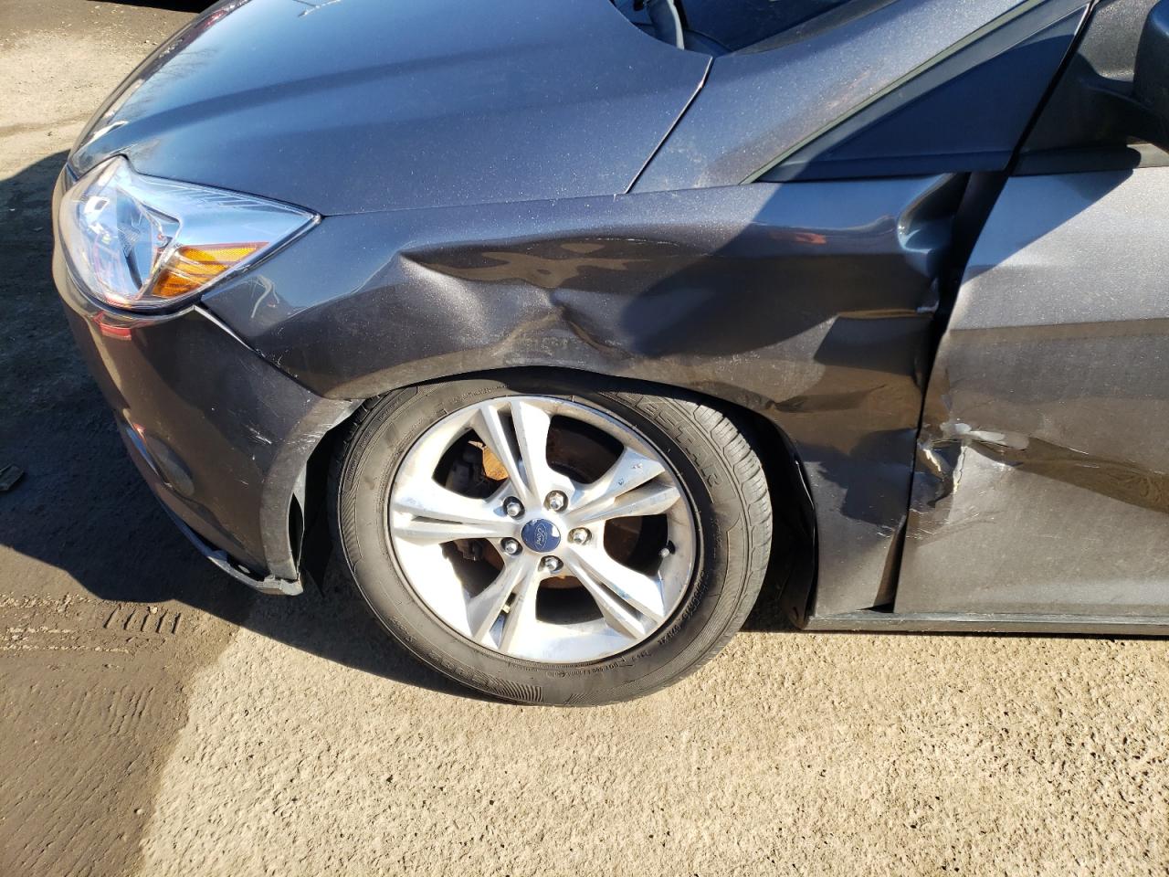 Photo 9 from auction – 2014 FORD FOCUS SE with VIN 1FADP3F24EL319680