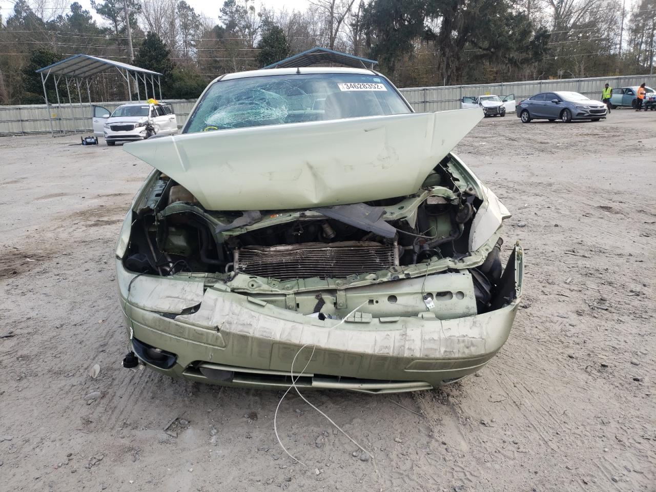 Photo 9 from auction – 2007 FORD FOCUS ZX4 with VIN 1FAHP34N97W273652