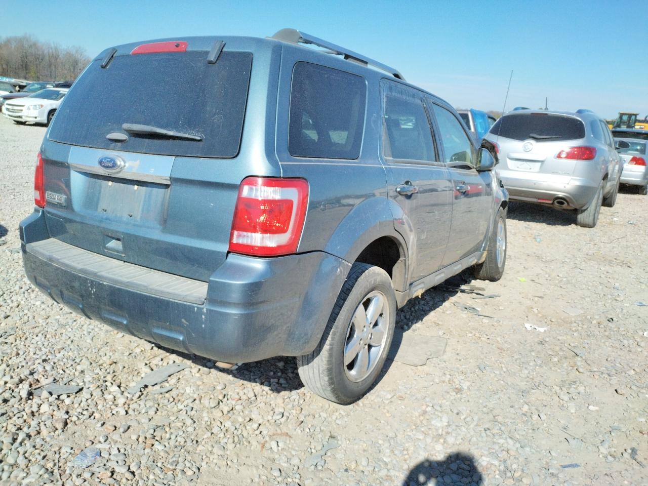 Photo 4 from auction – 2011 FORD ESCAPE LIM with VIN 1FMCU0E74BKB09782