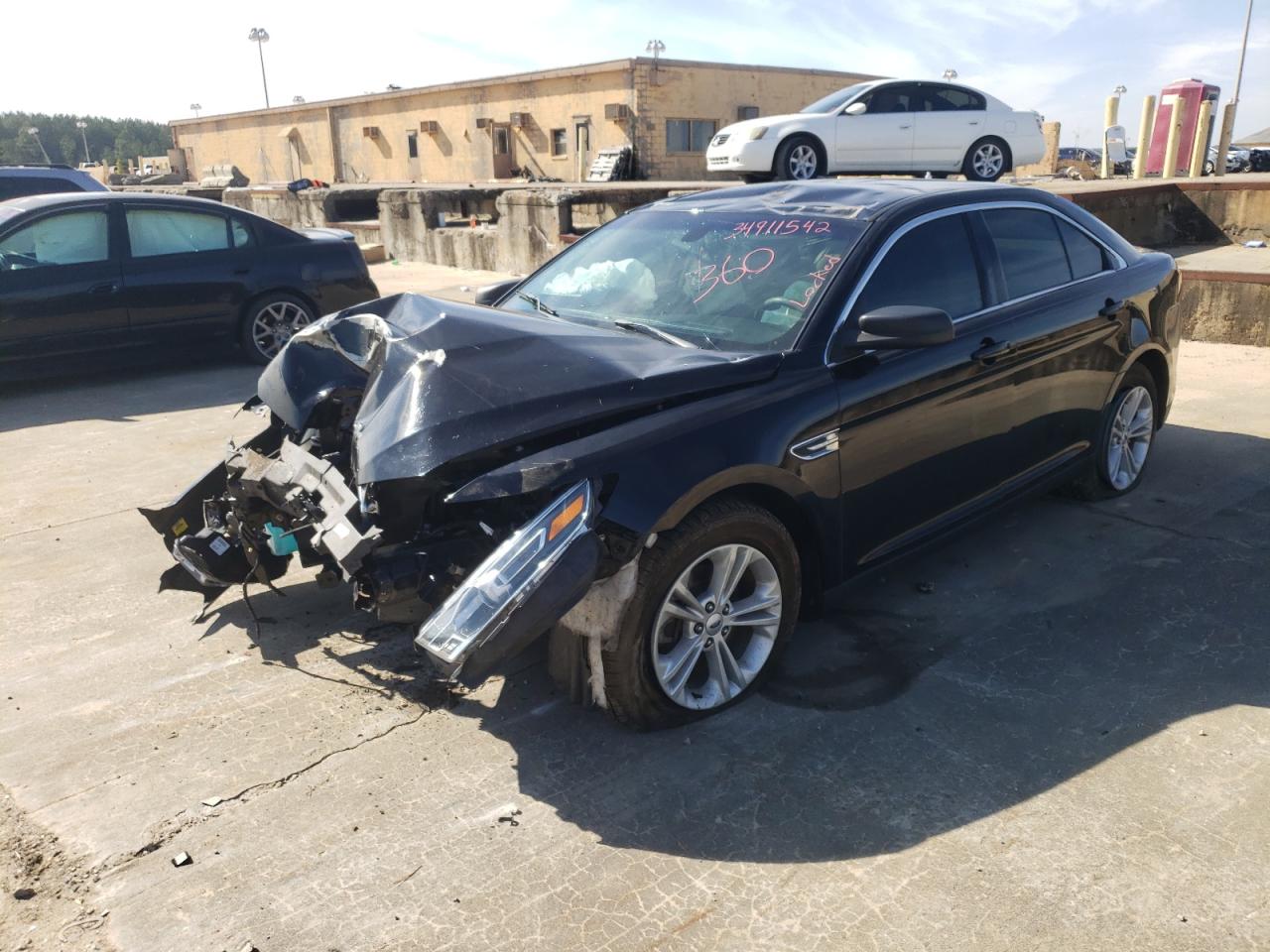 Photo 2 from auction – 2017 FORD TAURUS SE with VIN 1FAHP2D80HG144361