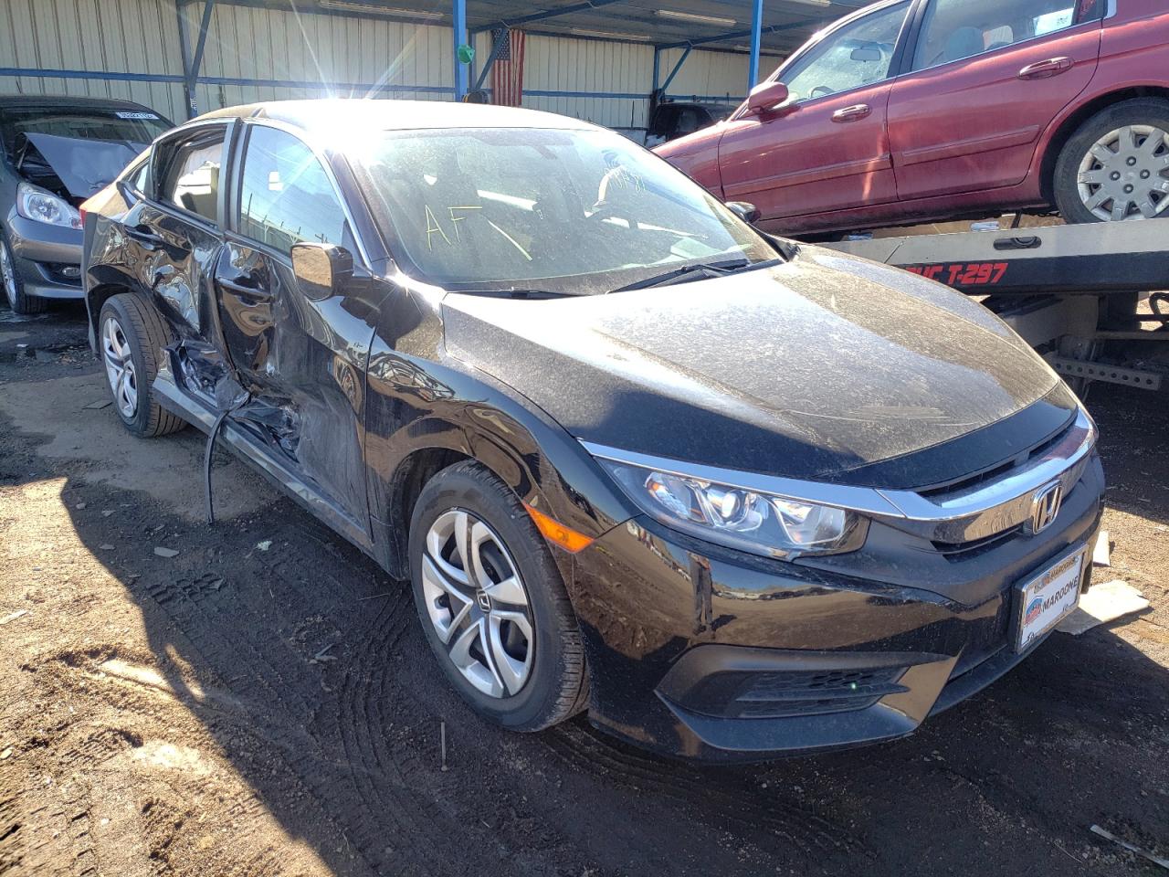 HONDA CIVIC LX 2018 with VIN 19XFC2F57JE040682 - Photo from auction