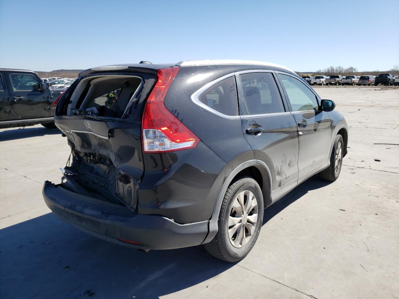 Photo 4 from auction – 2014 HONDA CR-V EXL with VIN 2HKRM3H7XEH537239