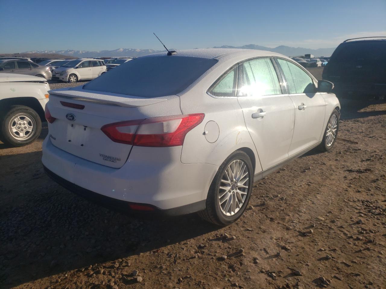 Photo 4 from auction – 2014 FORD FOCUS TITA with VIN 1FADP3J29EL229898