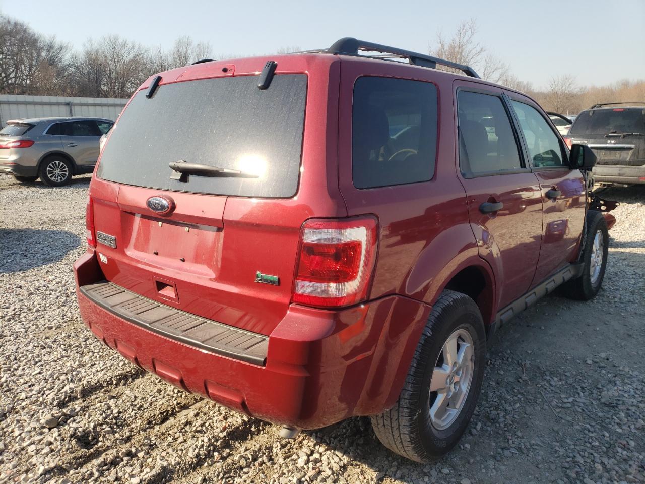 Photo 4 from auction – 2011 FORD ESCAPE XLT with VIN 1FMCU0DG4BKA07349