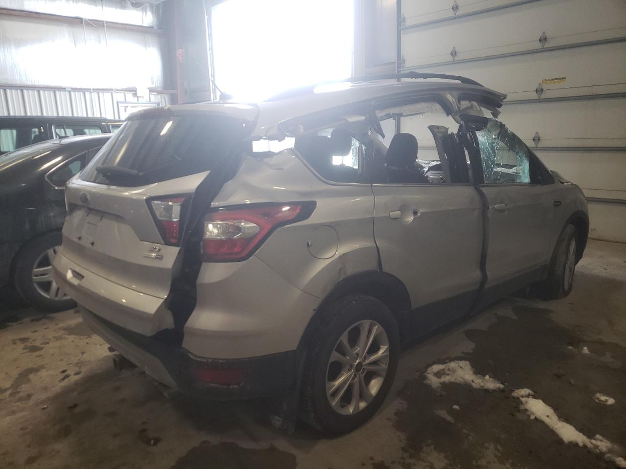 Photo 4 from auction – 2018 FORD ESCAPE SE with VIN 1FMCU9GD8JUC68069