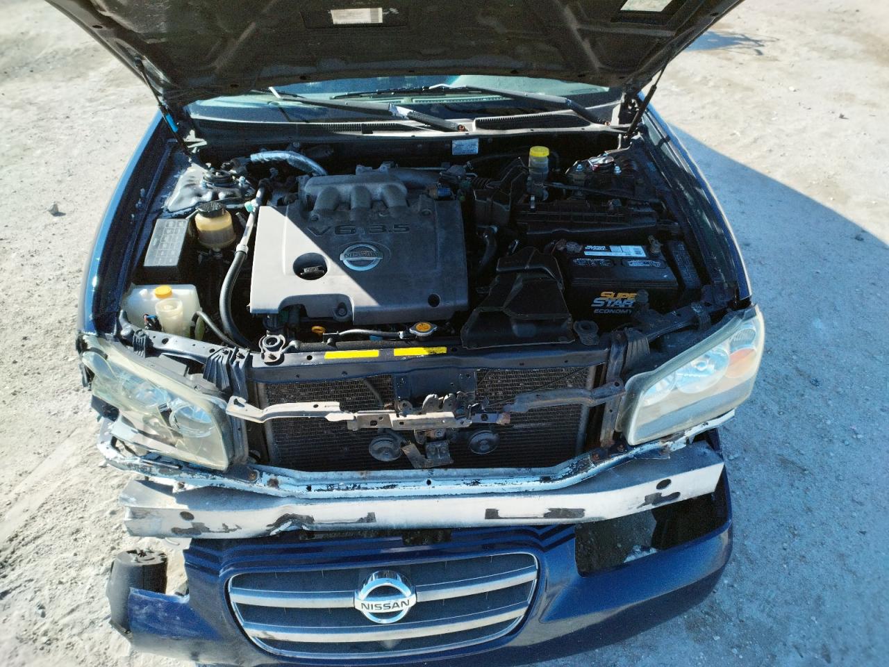 Photo 7 from auction – 2002 NISSAN MAXIMA GLE with VIN JN1DA31A82T300803