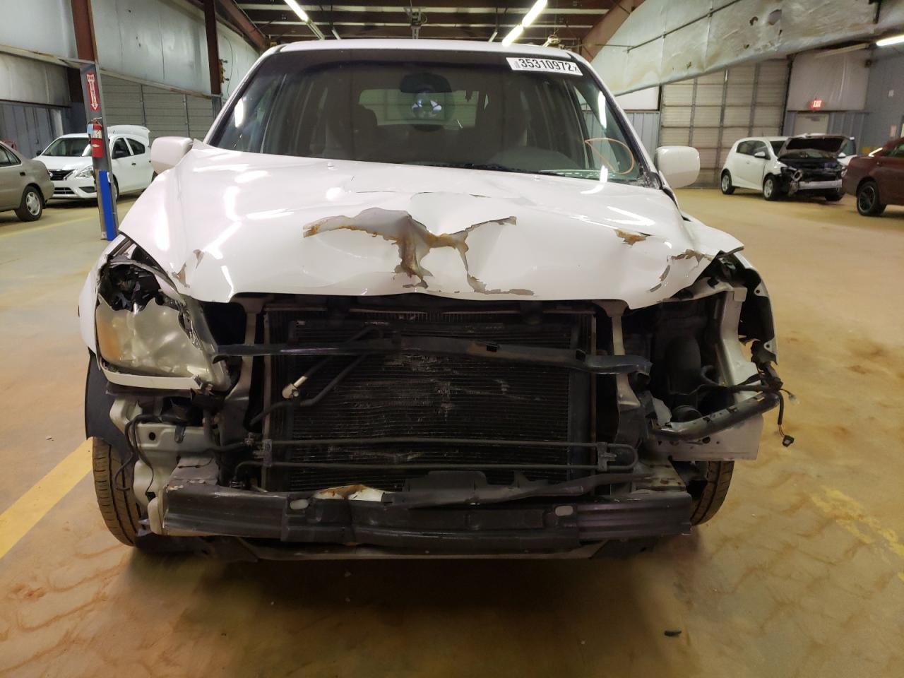 Photo 9 from auction – 2005 HONDA PILOT EX with VIN 5FNYF18465B017182