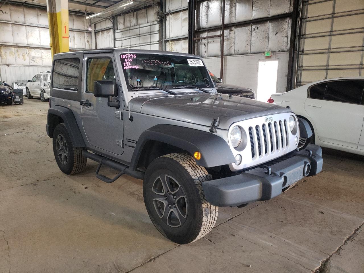 JEEP WRANGLER S 2016 with VIN 1C4AJWAG4GL242301 - Photo from auction