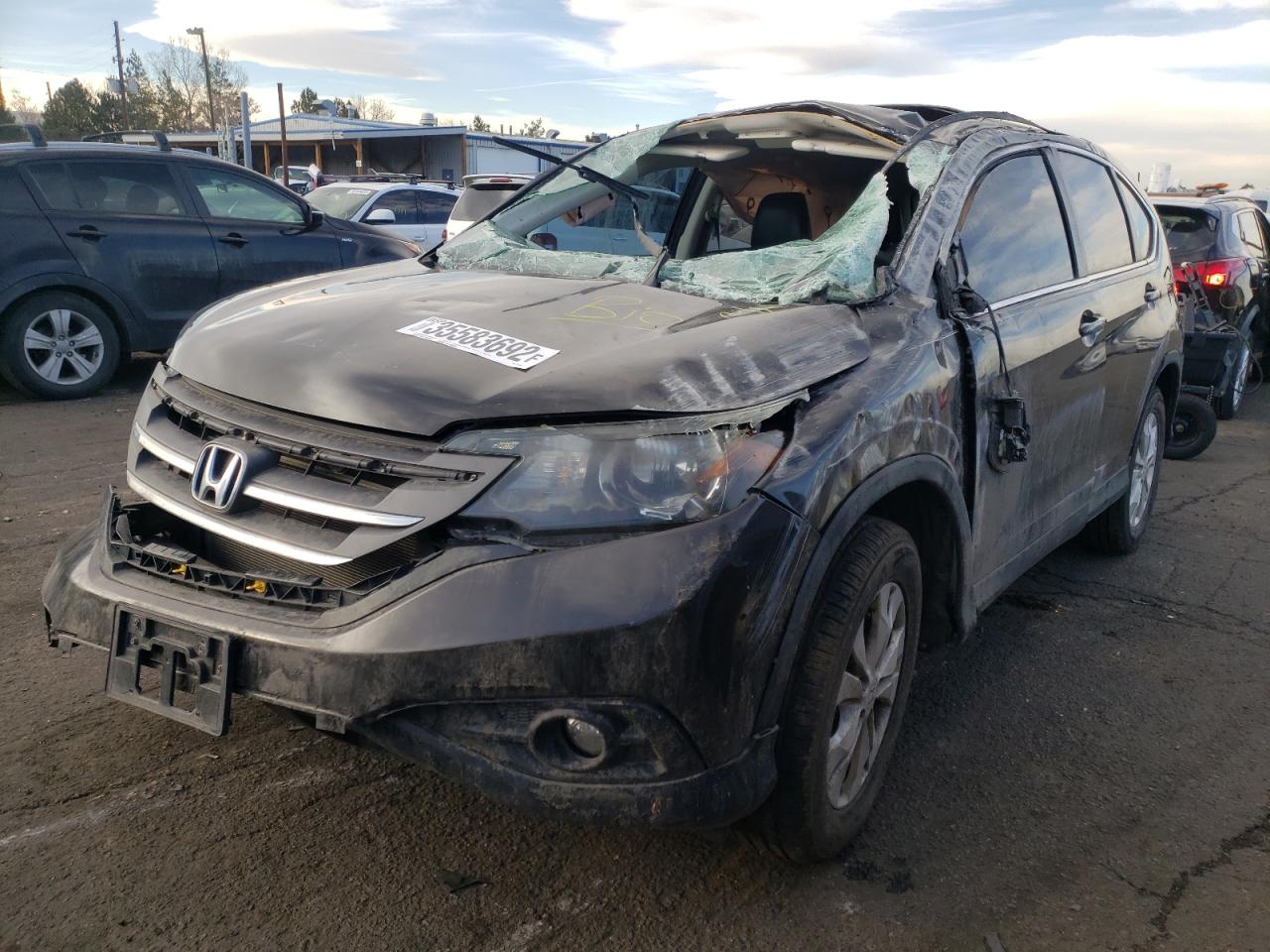 Photo 2 from auction – 2014 HONDA CR-V EX with VIN 5J6RM4H52EL073082